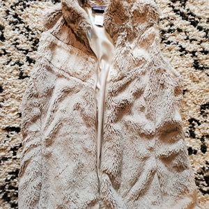 Patagonia cream faux fur vest